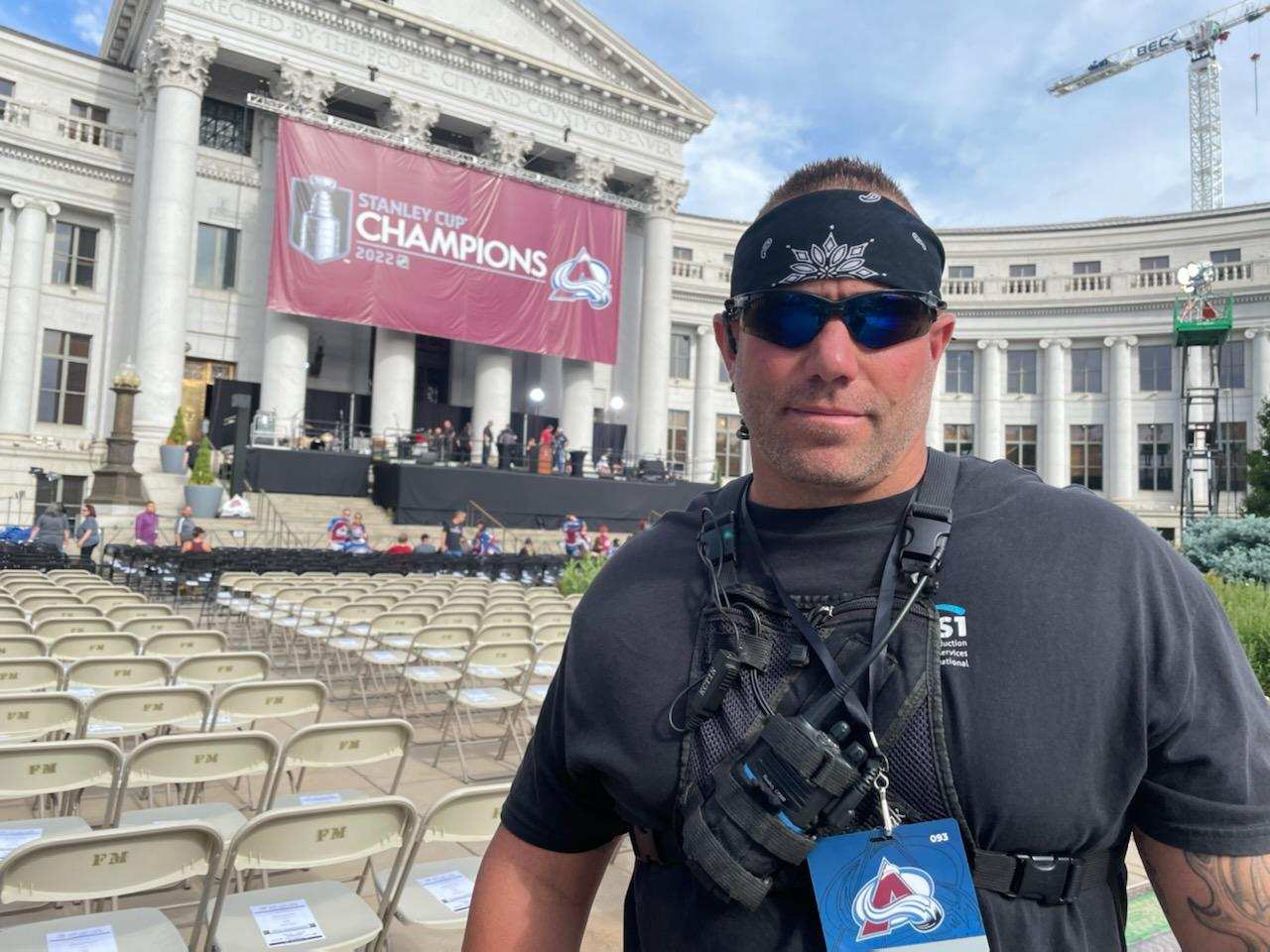 Jesse Jaco, on-site manager for Light Source Denver, overseeing lighting and production setup at a major Denver event